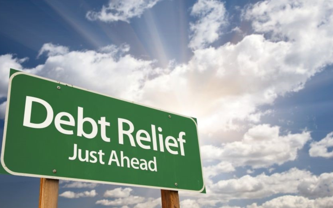 sign stating “debt relief just ahead”